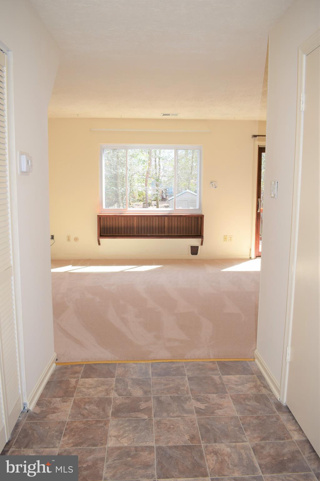 3294 Ryon Court Waldorf, MD 20601 - Photo 22 of 46 Main level hall to family room