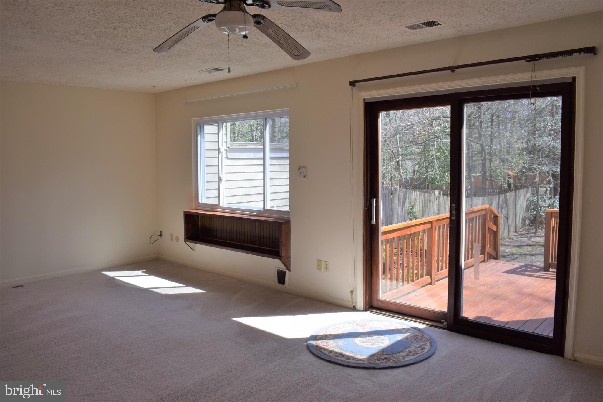 3294 Ryon Court Waldorf, MD 20601 - Photo 23 of 46 Natural light in family room with built in shelves