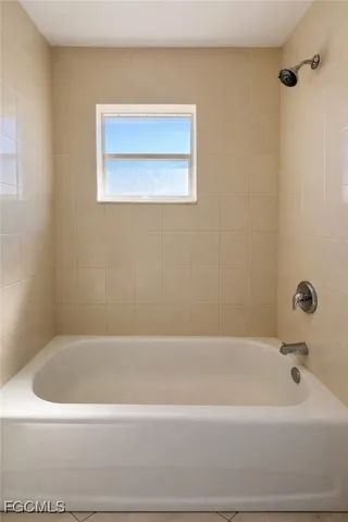 a bathroom with a bathtub