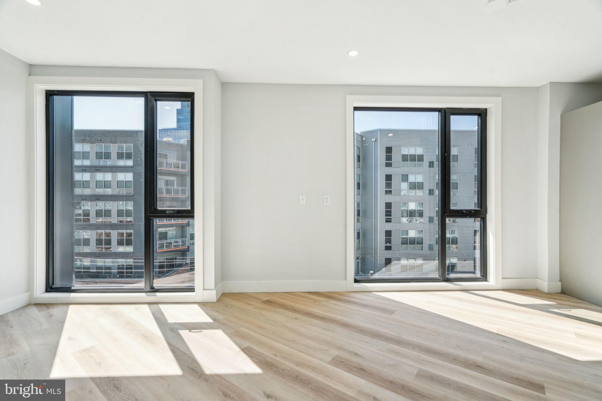 3748-9 Lancaster Avenue, Unit 211 Philadelphia, PA 19104 - Photo 13 of 29 a view of a room with a large window