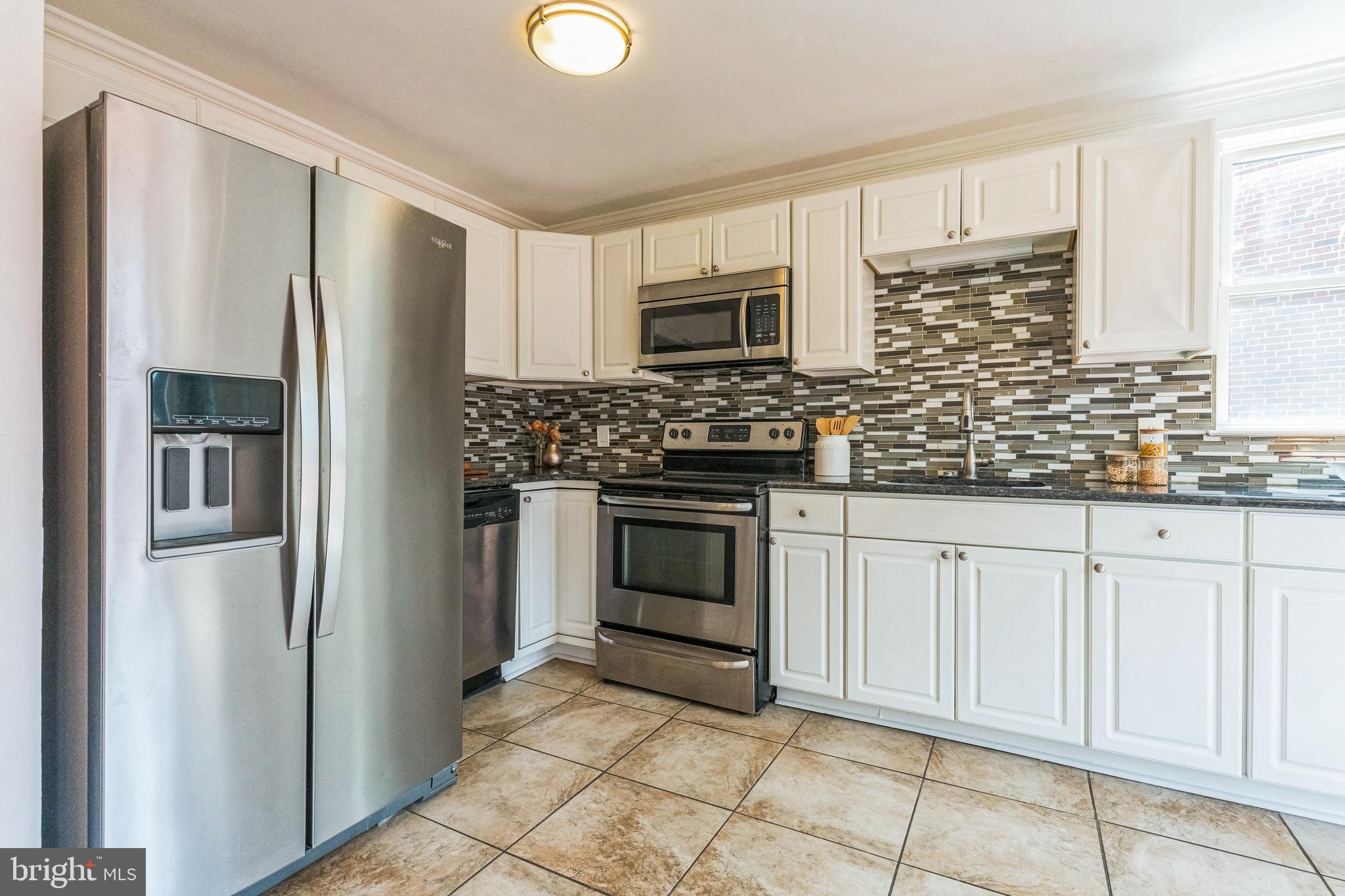 1681 Powell Road Brookhaven, PA 19015 - Photo 12 of 34 Kitchen with stainless steel appliances
