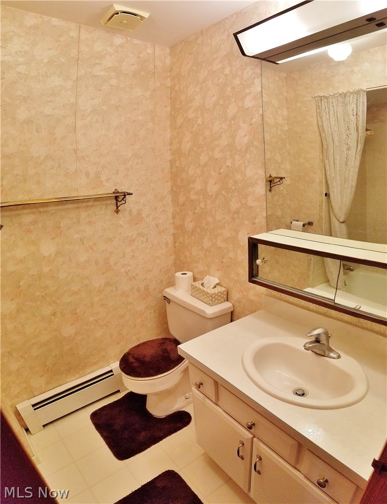 2888 Pressler Road Uniontown, OH 44685 - Photo 12 of 26 Main bath with shower tub (see reflection in mirror)