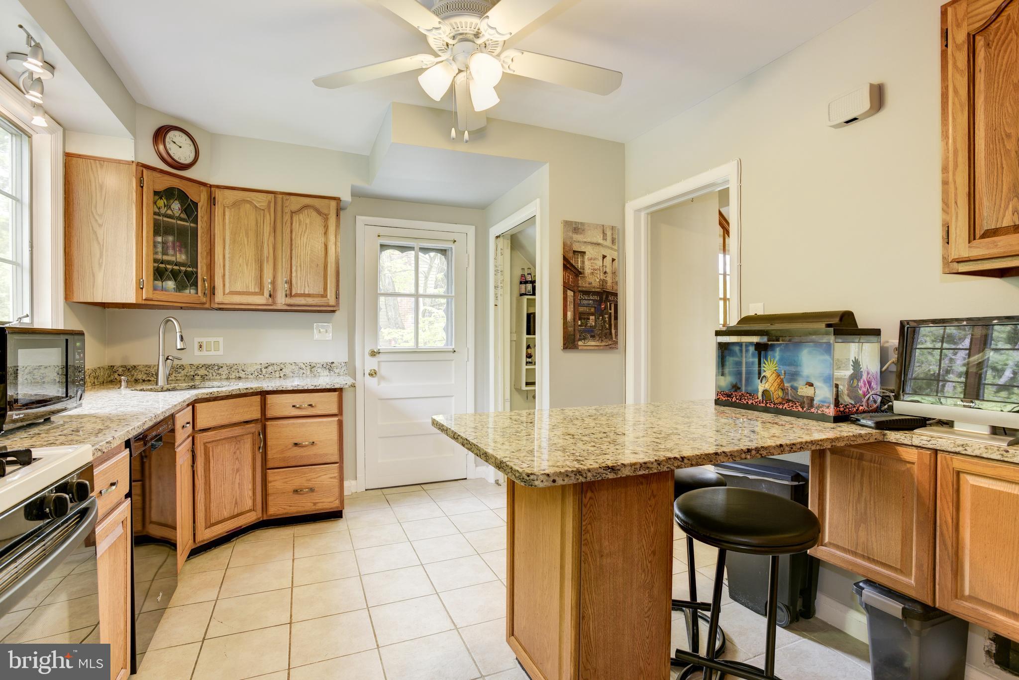 1306 Charmuth Road Lutherville-Timonium, MD 21093 - Photo 13 of 47 Kitchen with breakfast bar.