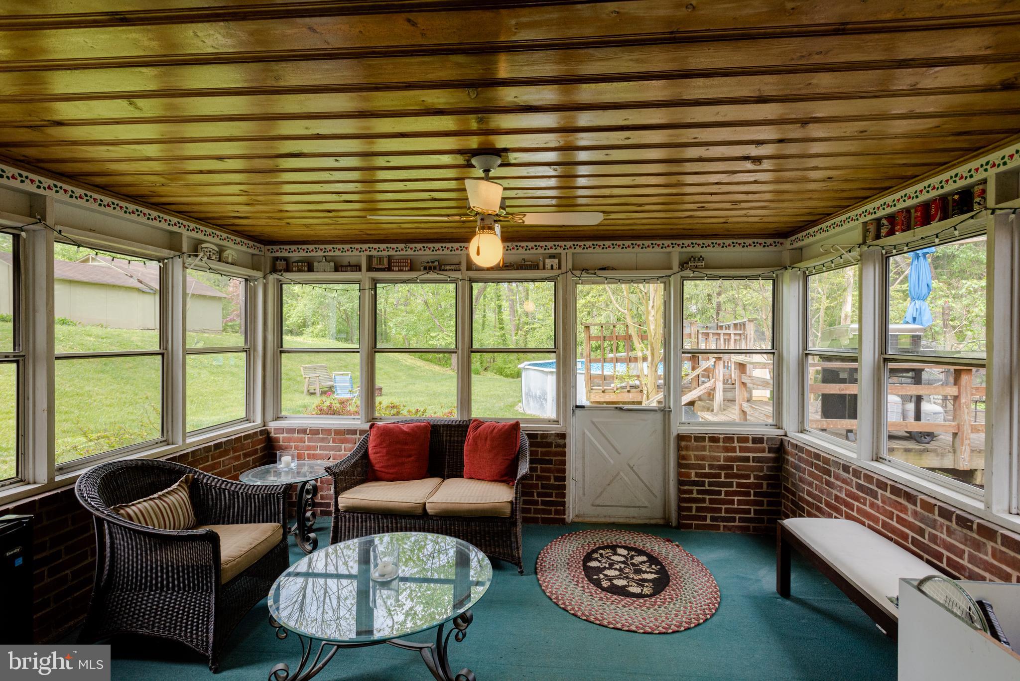 1306 Charmuth Road Lutherville-Timonium, MD 21093 - Photo 32 of 47 Screened porch for lazy afternoons