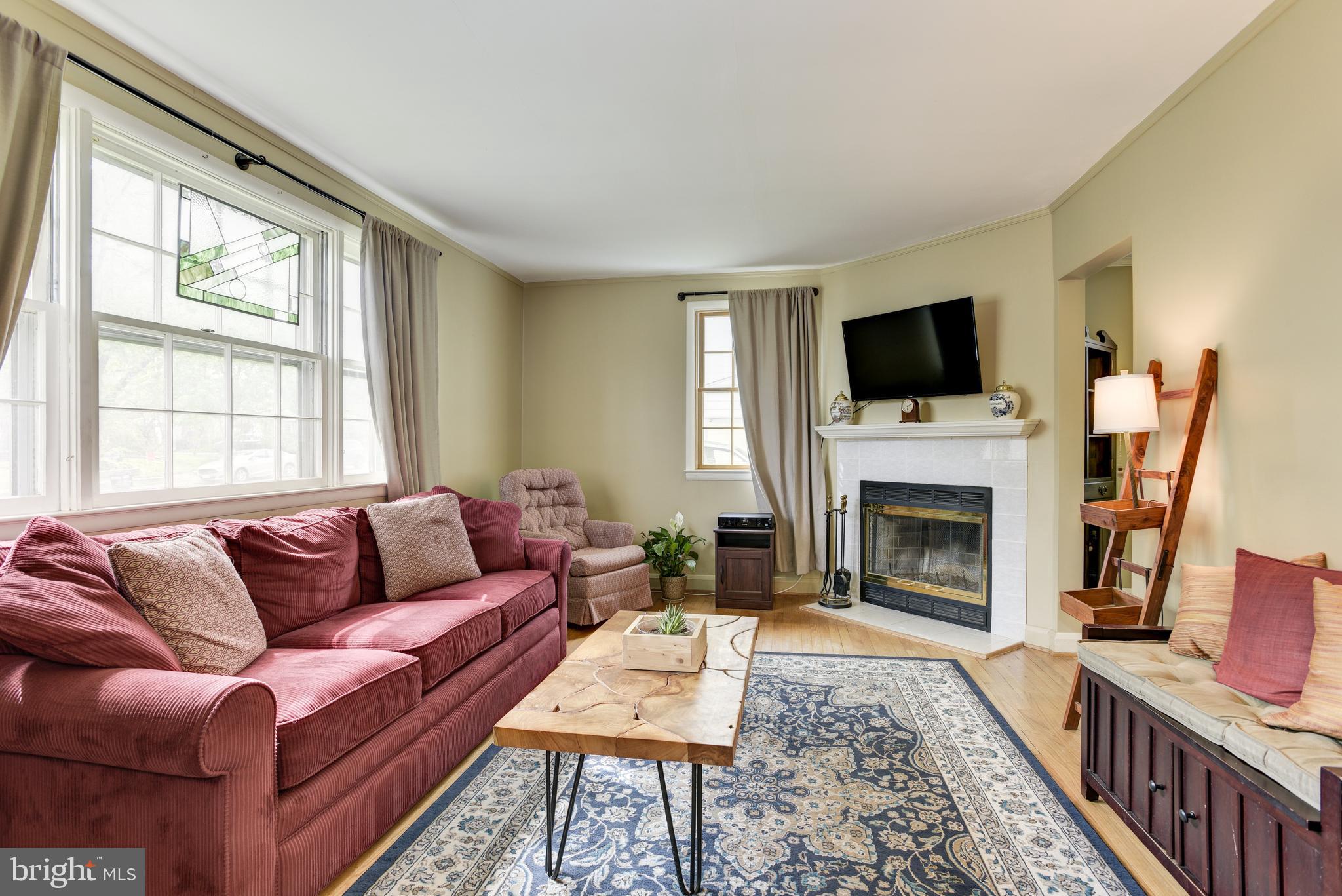 1306 Charmuth Road Lutherville-Timonium, MD 21093 - Photo 9 of 47 Living room. Lots of light.