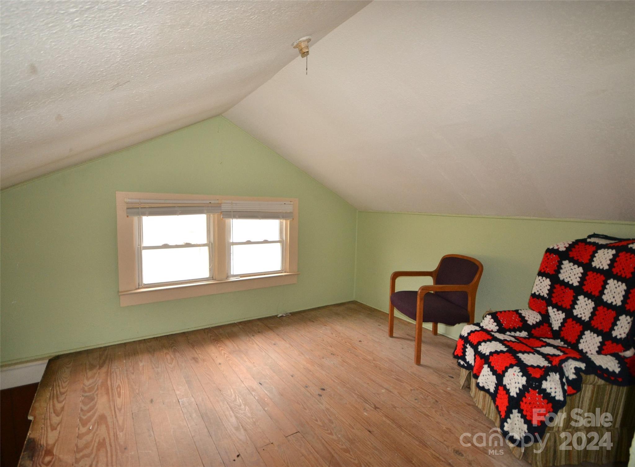 46 Murray Road Canton, NC 28716 - Photo 16 of 17 a view of room with lounge chair and wooden floor