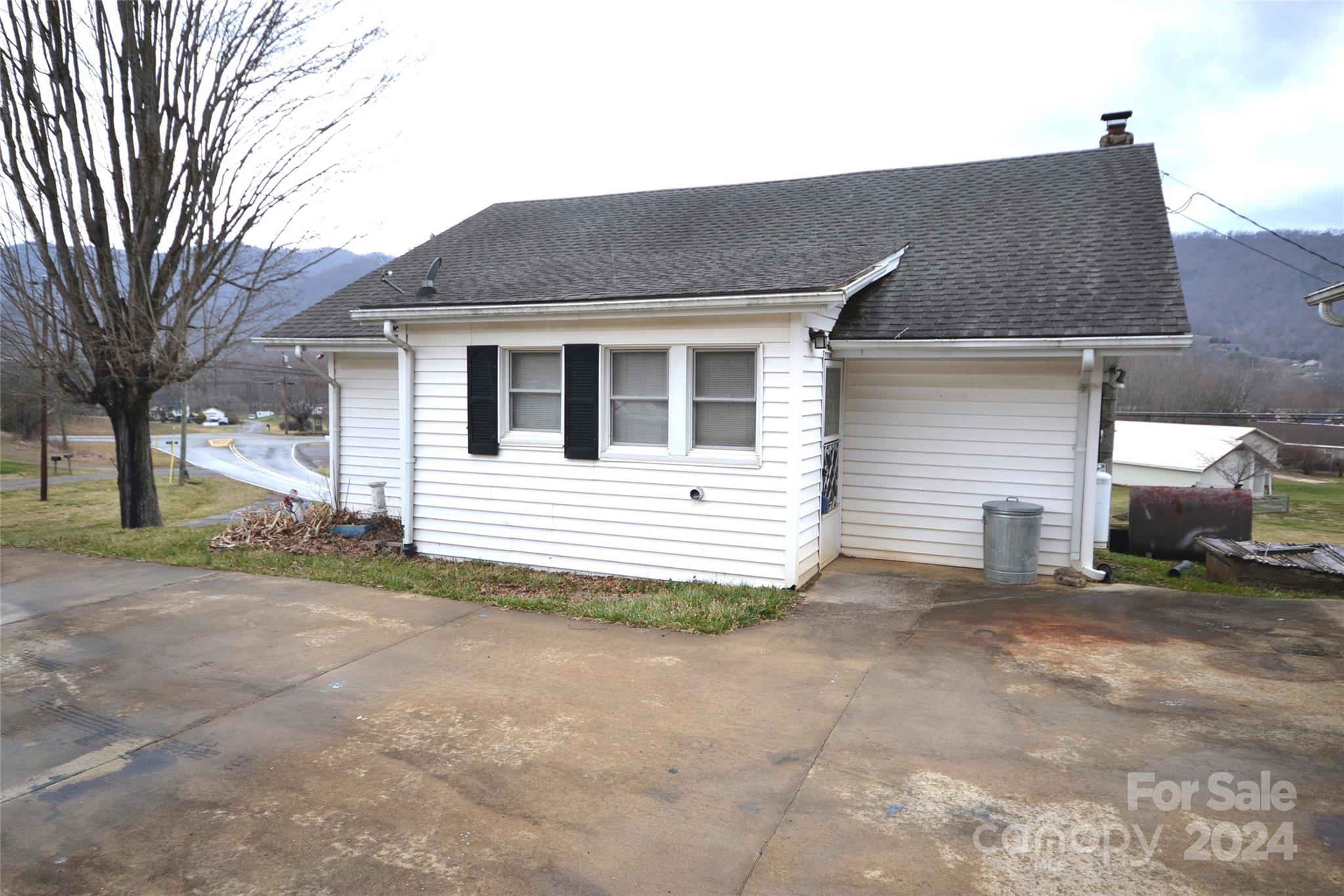 46 Murray Road Canton, NC 28716 - Photo 4 of 17 a house that has a lot of windows on it