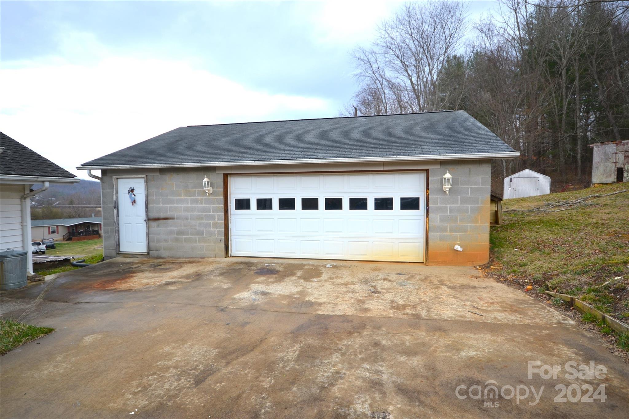 46 Murray Road Canton, NC 28716 - Photo 6 of 17 a house with trees in front of it