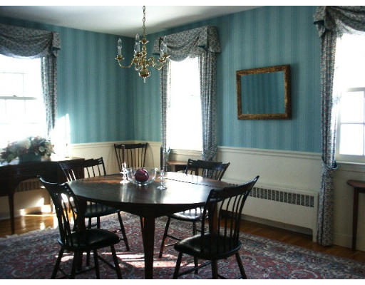 360 Woodland Road Brookline, MA 02467 - Photo 3 of 10 a view of a dining room with furniture and window