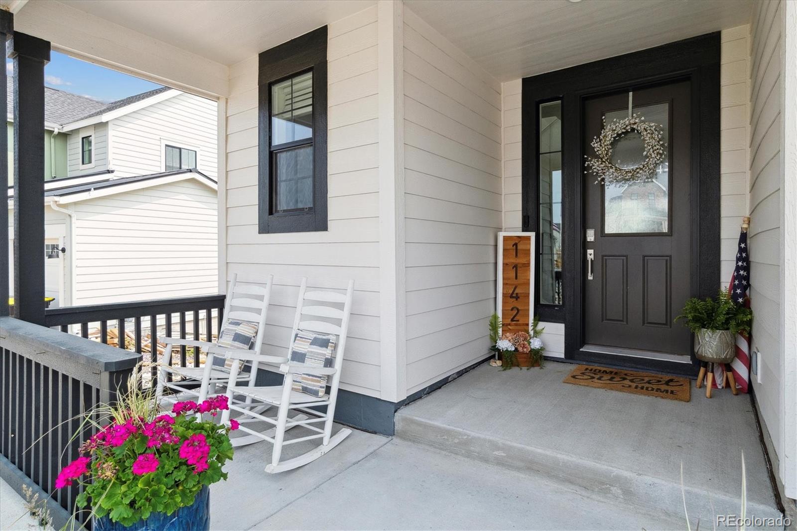 1142 Williams Loop Elizabeth, CO 80107 - Photo 3 of 38 a front view of a house with entryway