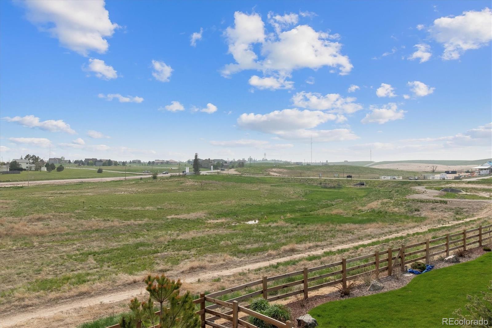 1142 Williams Loop Elizabeth, CO 80107 - Photo 36 of 38 a view of an ocean and beach