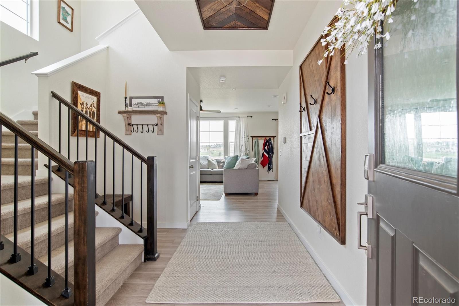 1142 Williams Loop Elizabeth, CO 80107 - Photo 4 of 38 a view of a hallway view with staircase