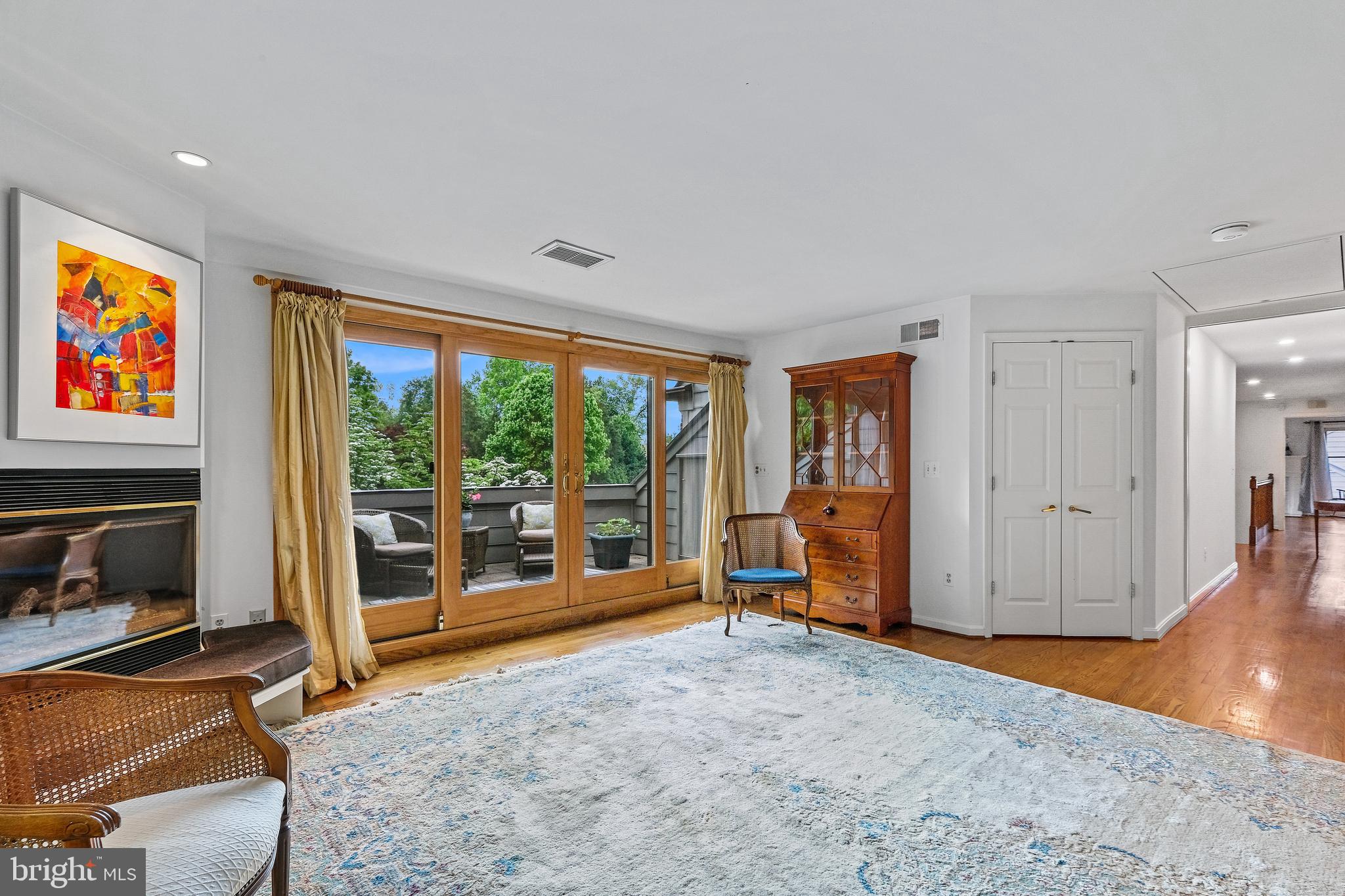 8317 Comanche Court Bethesda, MD 20817 - Photo 35 of 86 Fireplace and doors to balcony