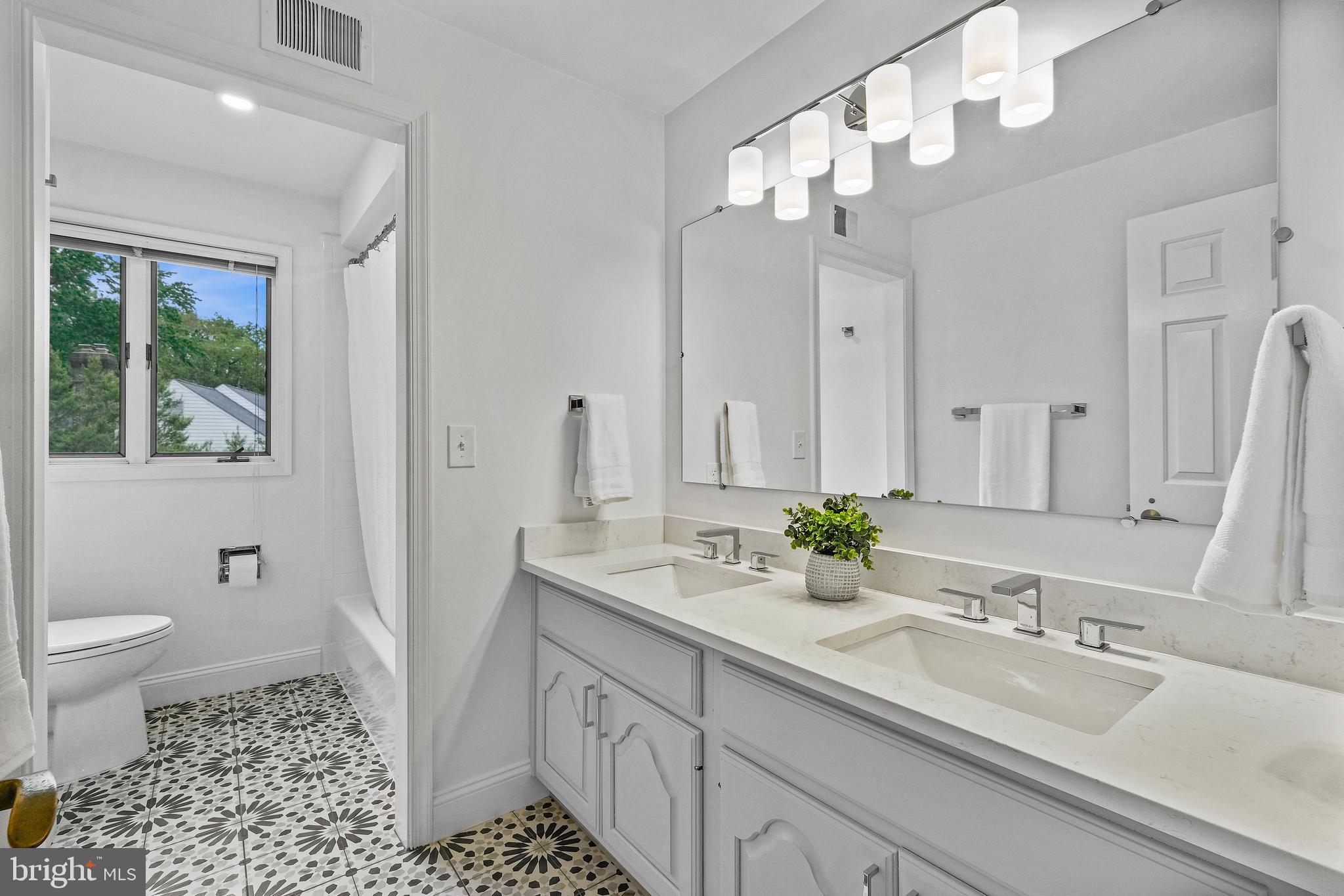 8317 Comanche Court Bethesda, MD 20817 - Photo 57 of 86 Renovated hall bath, double sink