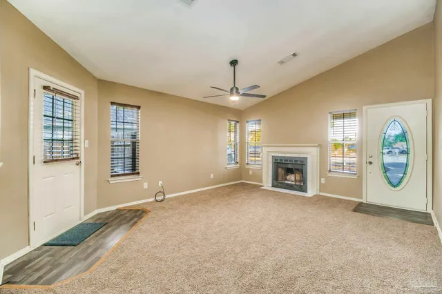 a view of a livingroom with a furniture