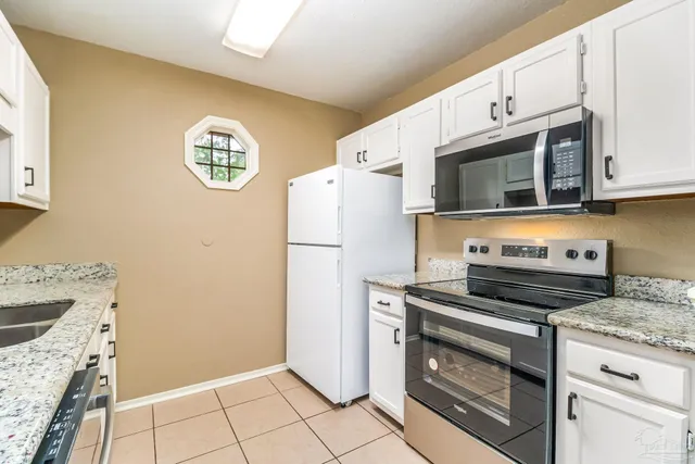 a bathroom with a toilet and a bathtub