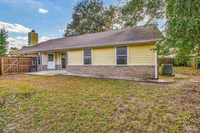 a view of house with outdoor space