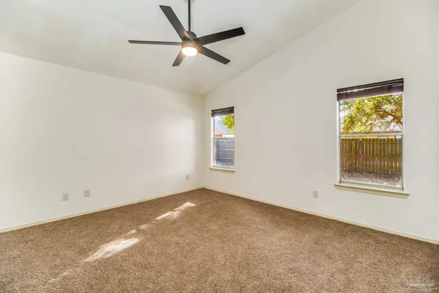 a house with trees in the background