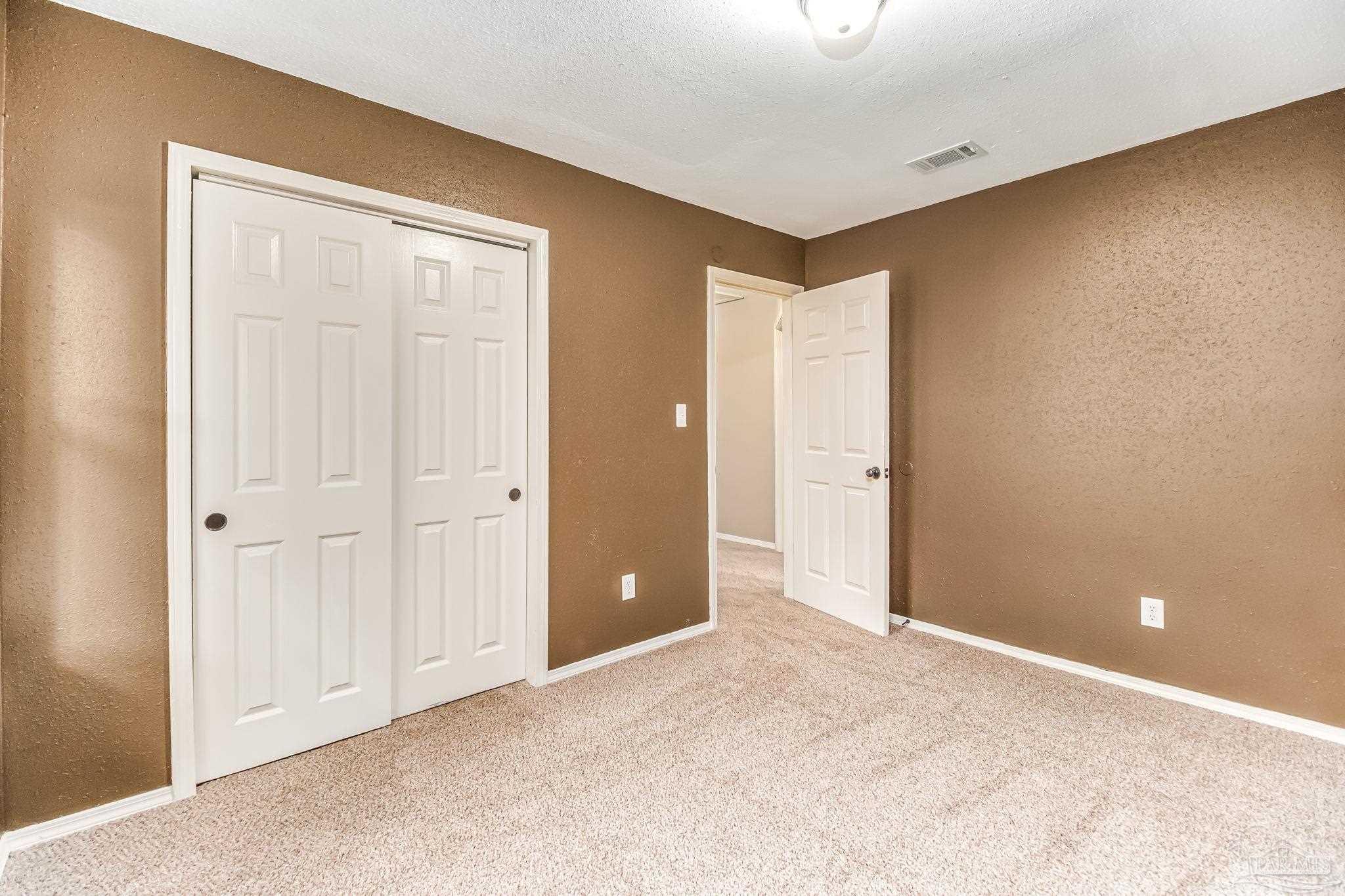 4554 Northpointe Place Pensacola, FL 32514 - Photo 31 of 42 a view of an empty room