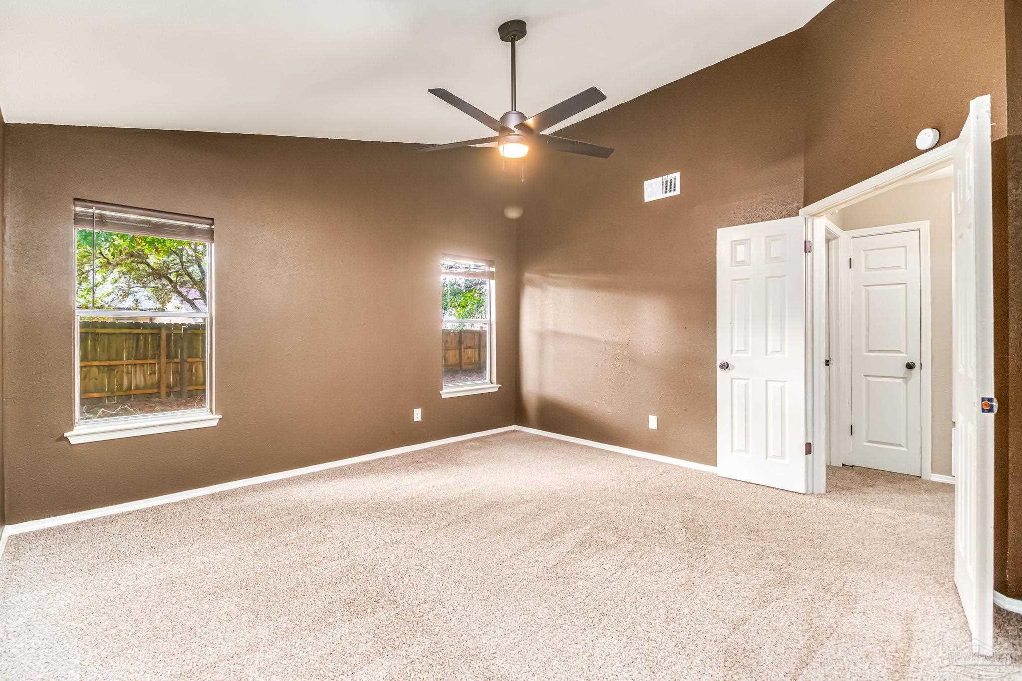 4554 Northpointe Place Pensacola, FL 32514 - Photo 9 of 42 a view of an empty room with a window