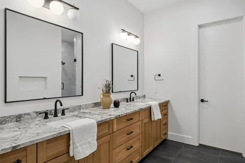 a white bath tub sitting in a bathroom