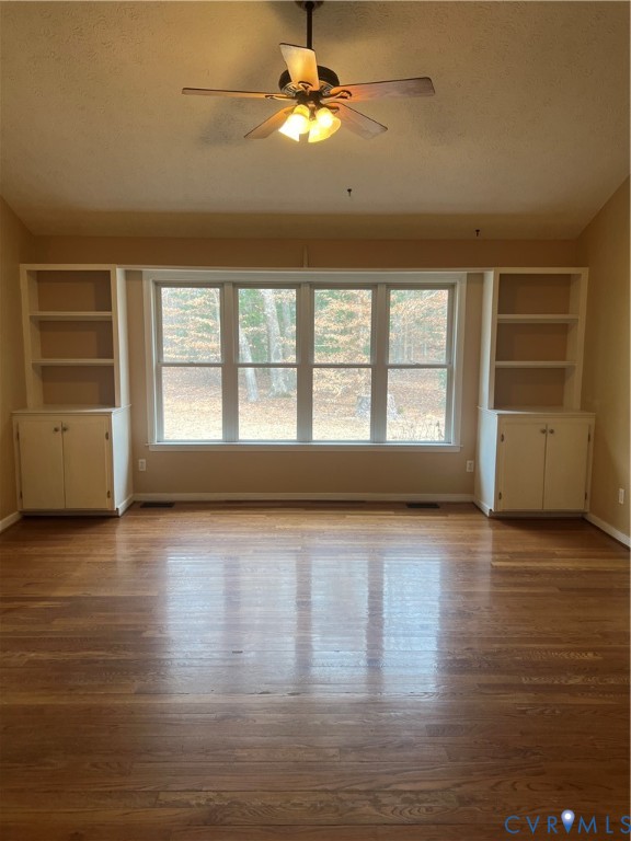 12960 Moody Road Hopewell, VA 23860 - Photo 14 of 33 Unfurnished living room featuring built in shelves