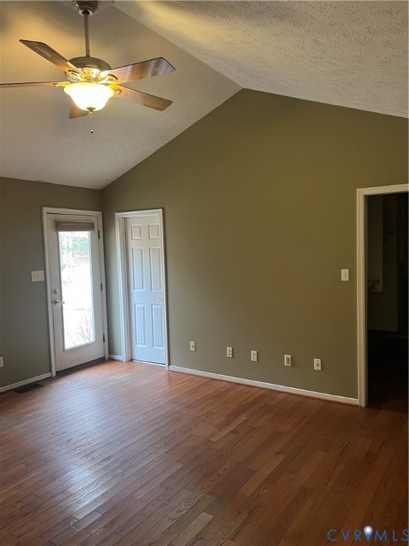 12960 Moody Road Hopewell, VA 23860 - Photo 17 of 33 Spare room featuring lofted ceiling, dark wood-sty