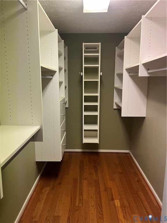 12960 Moody Road Hopewell, VA 23860 - Photo 18 of 33 Walk in closet featuring dark wood-style flooring