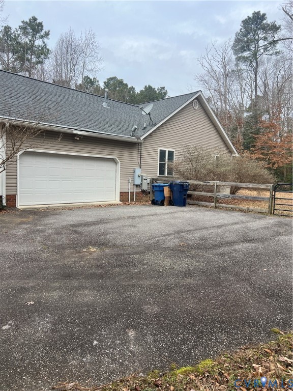 12960 Moody Road Hopewell, VA 23860 - Photo 2 of 33 View of side of home featuring roof with shingles,