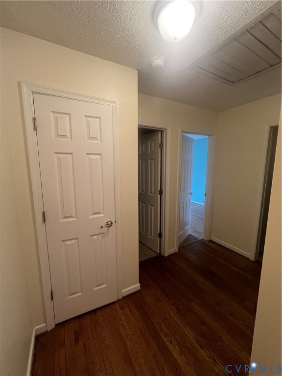12960 Moody Road Hopewell, VA 23860 - Photo 23 of 33 Hall featuring a textured ceiling, dark wood-style