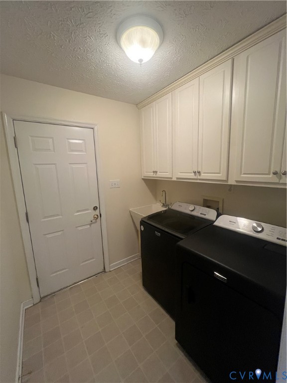 12960 Moody Road Hopewell, VA 23860 - Photo 27 of 33 Washroom featuring a textured ceiling, cabinet spa