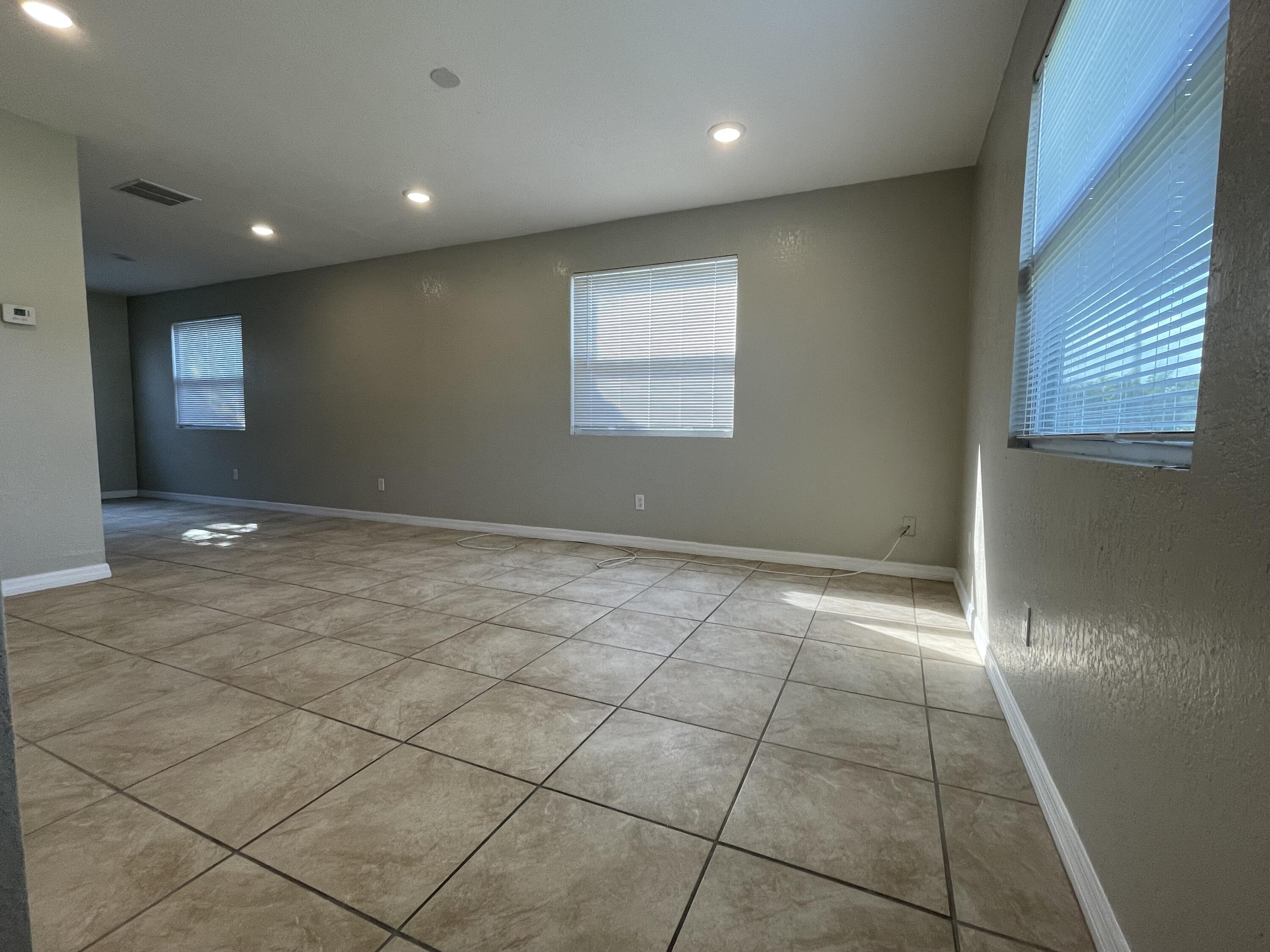 2880 Harson Way Fort Pierce, FL 34946 - Photo 3 of 40 a view of an empty room