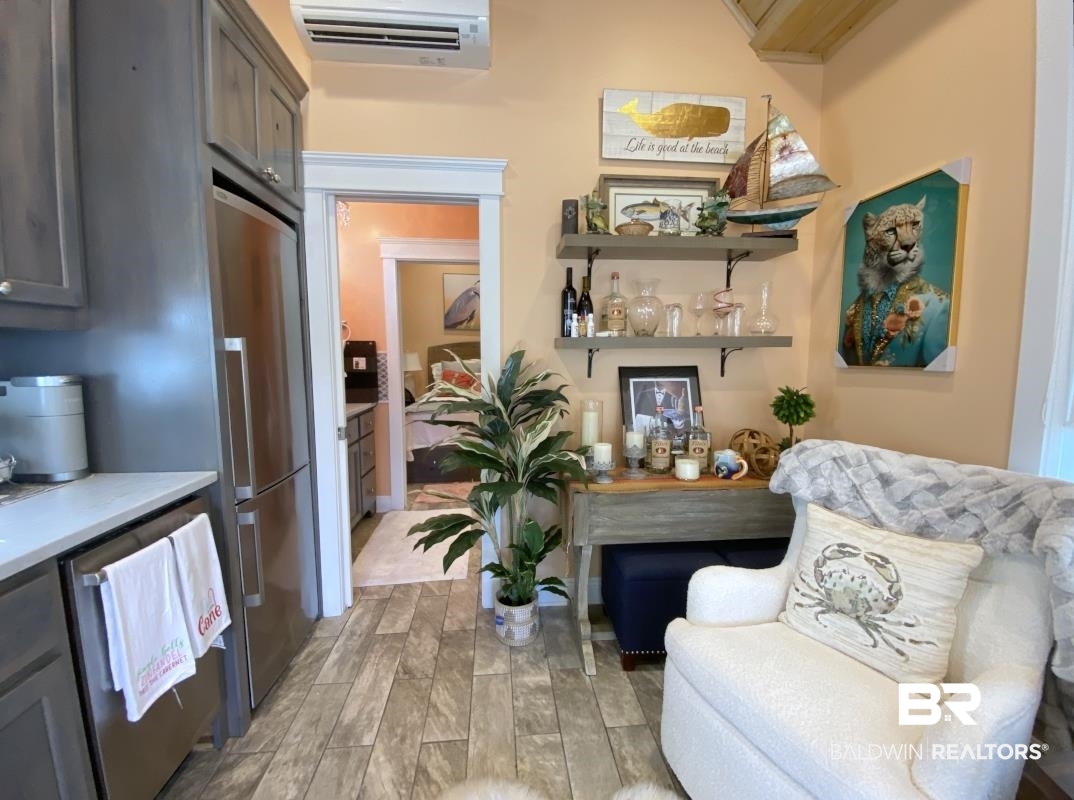 28888 Canal Road, Unit 32 Orange Beach, AL 36561 - Photo 13 of 29 Sitting room featuring light wood-type flooring