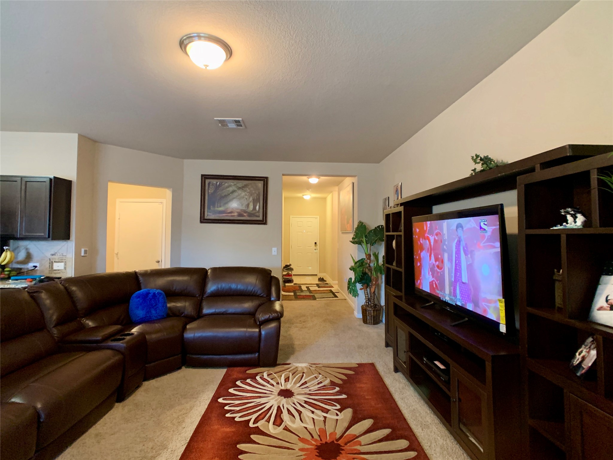 5721 Roderick Drive Austin, TX 78724 - Photo 22 of 26 Living area featuring light carpet