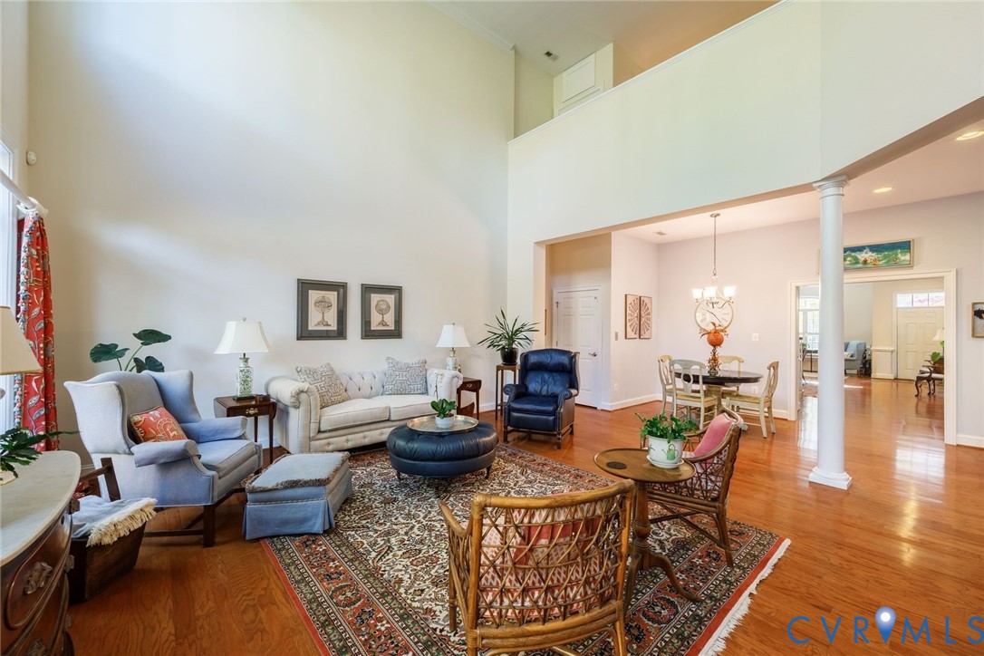 704 Chiswick Park Road Henrico, VA 23229 - Photo 13 of 47 a living room with furniture a rug and a table