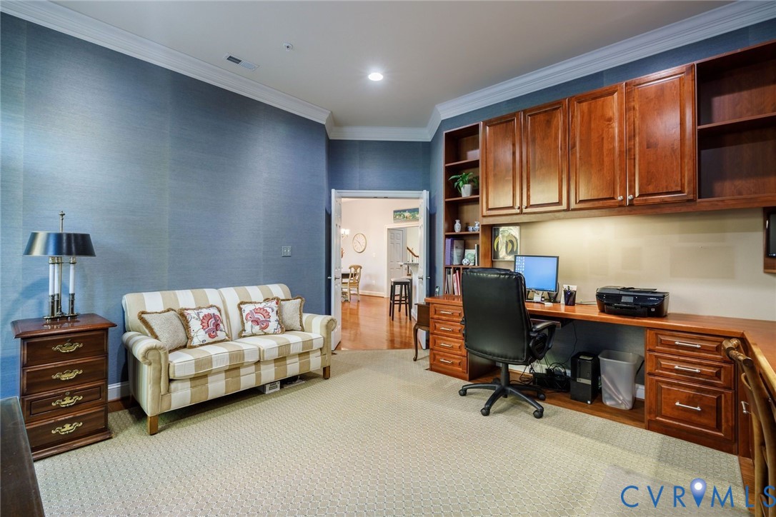 704 Chiswick Park Road Henrico, VA 23229 - Photo 21 of 47 a livingroom with workspace and a couch