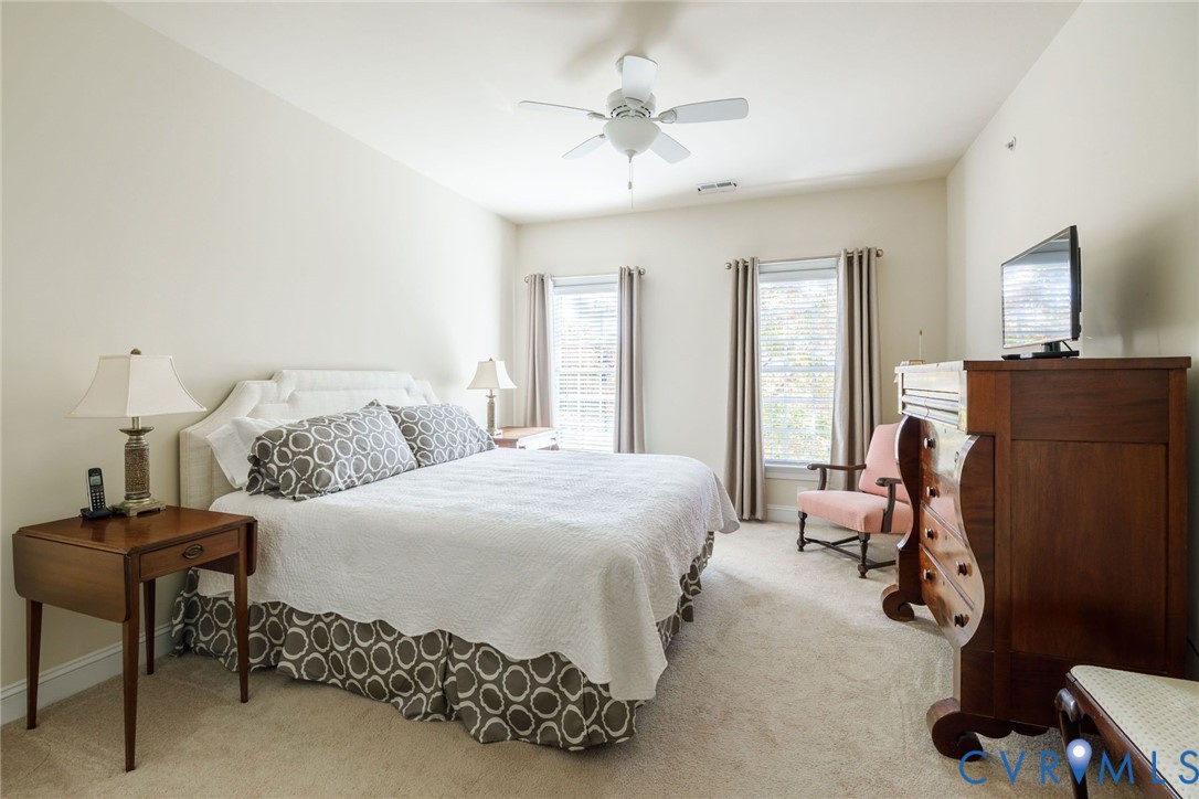 704 Chiswick Park Road Henrico, VA 23229 - Photo 29 of 47 a bedroom with a bed furniture and windows