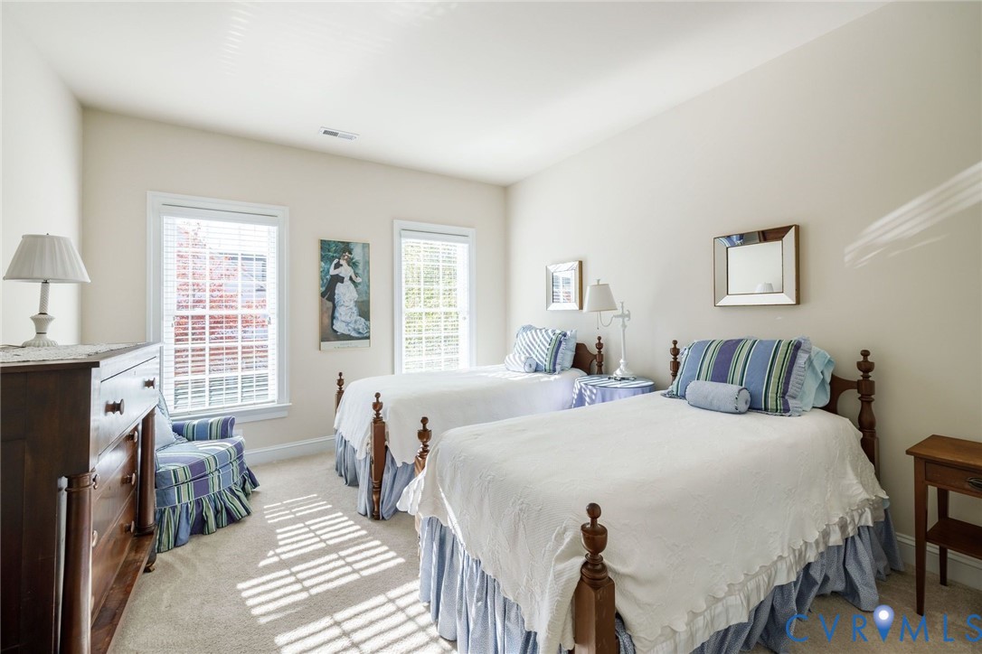 704 Chiswick Park Road Henrico, VA 23229 - Photo 31 of 47 a bed room with a bed and a couch