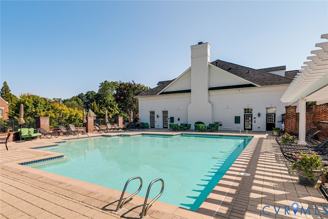 704 Chiswick Park Road Henrico, VA 23229 - Photo 47 of 47 a view of a swimming pool with a patio