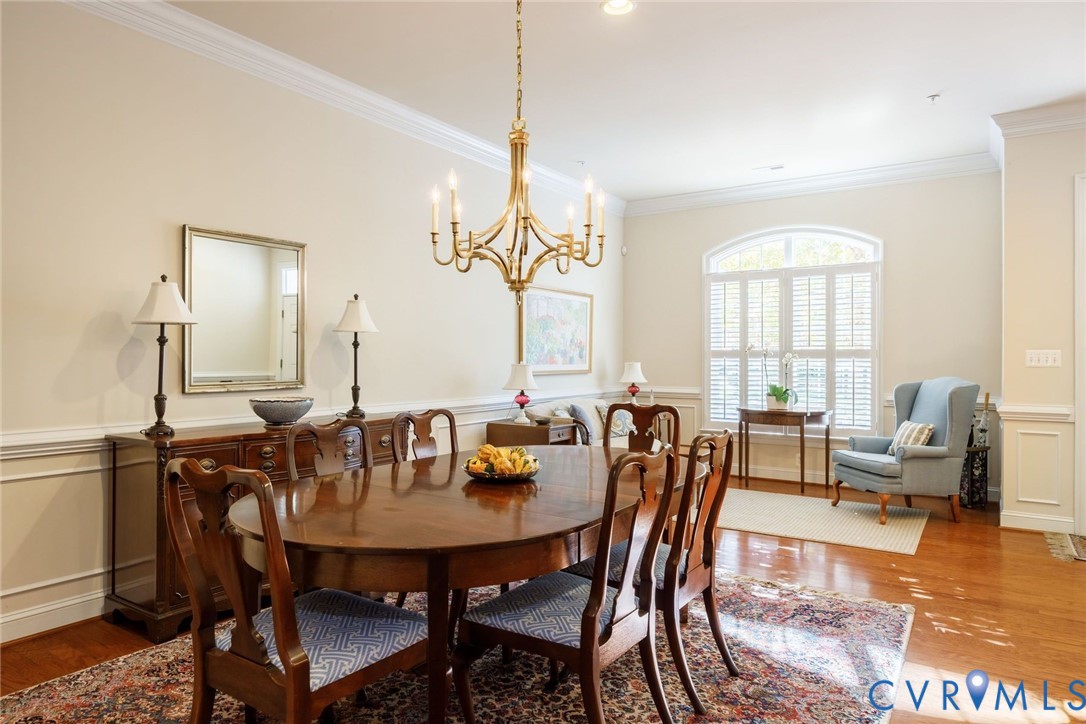 704 Chiswick Park Road Henrico, VA 23229 - Photo 9 of 47 a view of a a dining room with furniture window and wooden floor