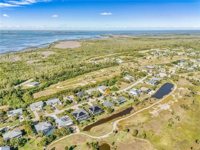 a view of an empty room with a lake view