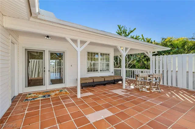 a lobby with table and chairs