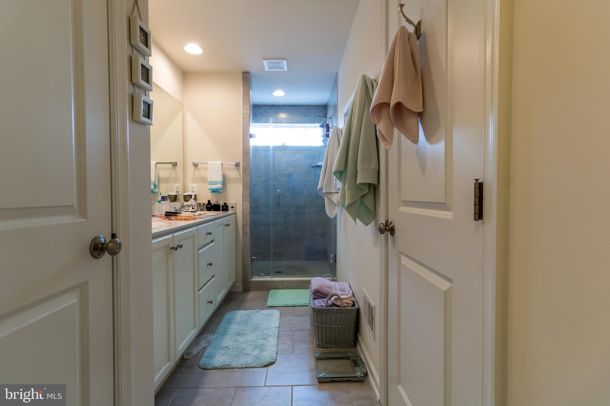 8414 Pine Bluff Road Frederick, MD 21704 - Photo 19 of 32 Master bathroom with double vanity and shower