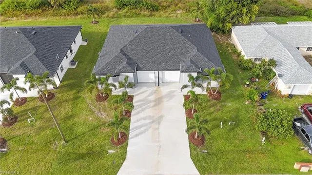 $499,999 | 847 Duplex Street East, Lehigh Acres, FL 33974