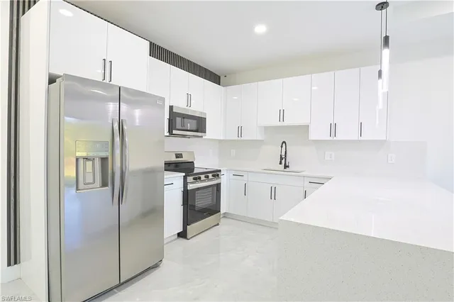 $499,999 | 847 Duplex Street East, Lehigh Acres, FL 33974