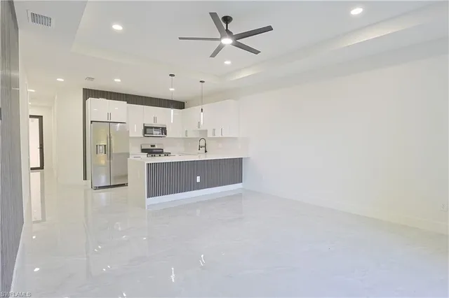 $499,999 | 847 Duplex Street East, Lehigh Acres, FL 33974