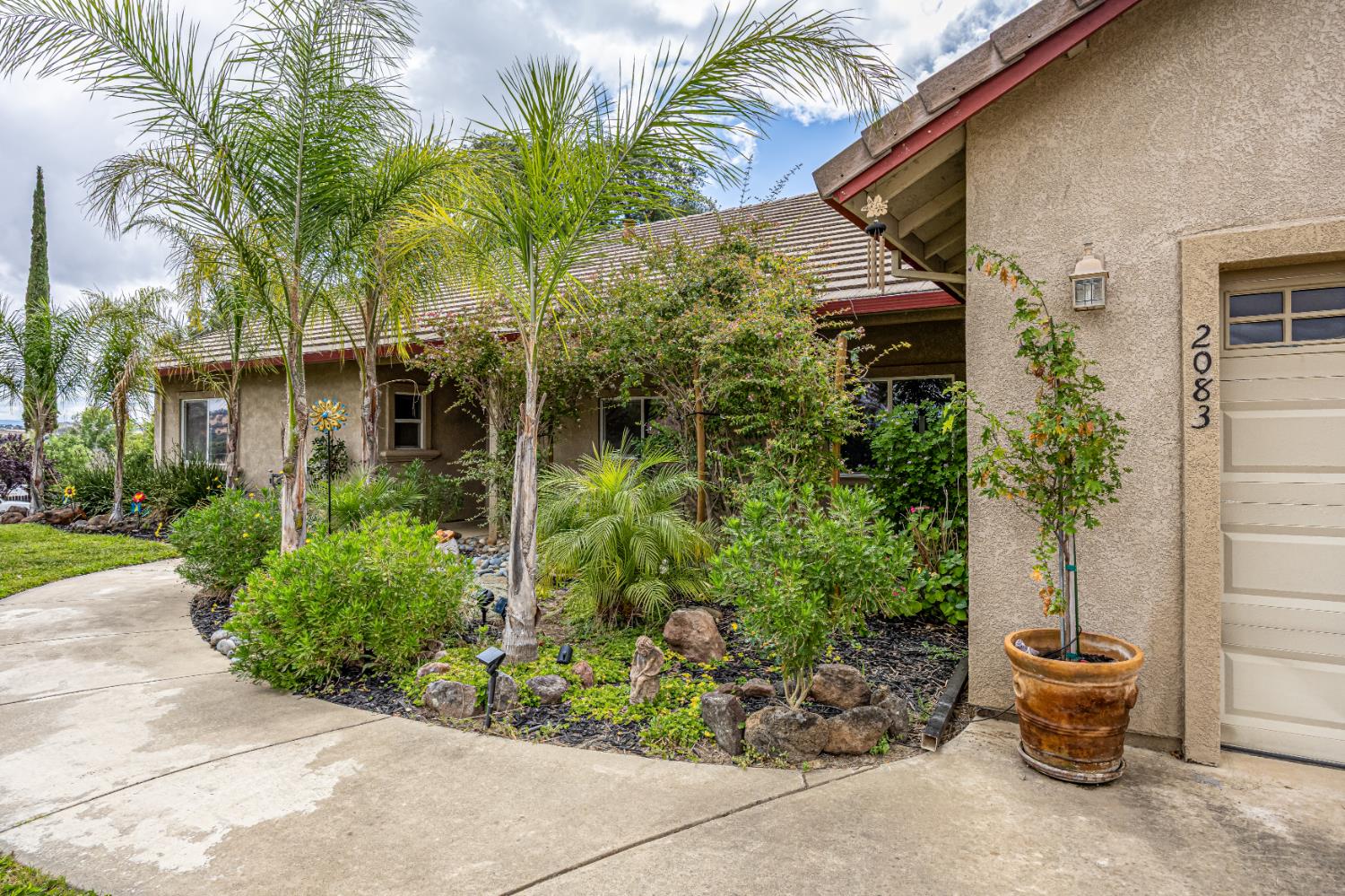 2083 State Rte 26 Valley Springs, CA 95252 - Photo 4 of 59 a couple of potted plants in front of house