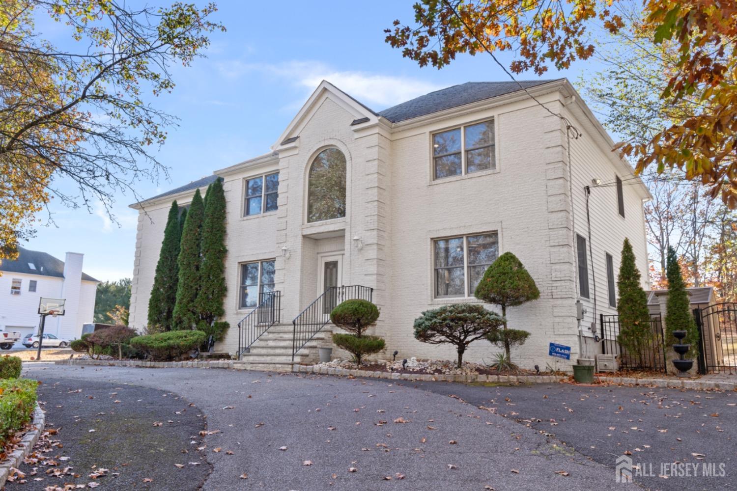 64 Westley Road Old Bridge, NJ 08857 - Photo 1 of 1 a view of a house with a yard and a street