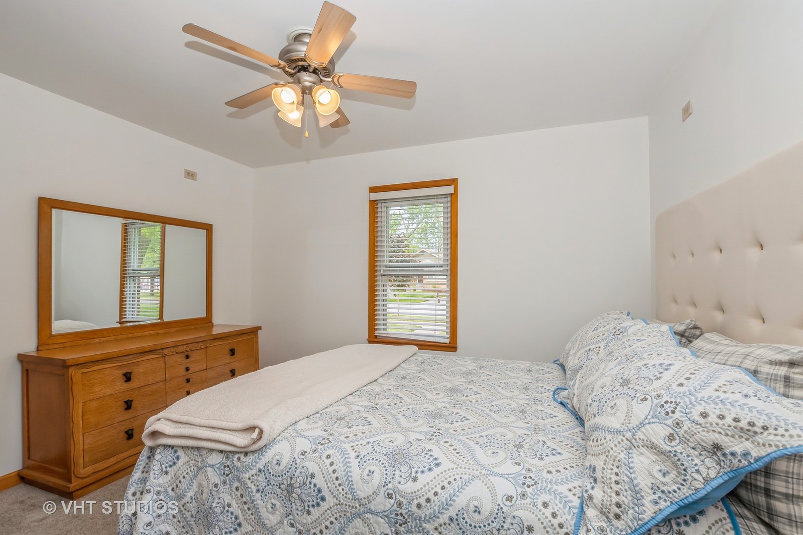 10743 Lombard Avenue Chicago Ridge, IL 60415 - Photo 8 of 20 a bedroom with a bed and window