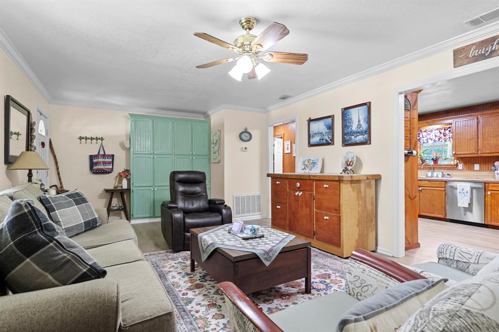 236 Circle Drive Point, TX 75472 - Photo 5 of 25 A seamless layout that fosters connection, laughter, and shared moments.